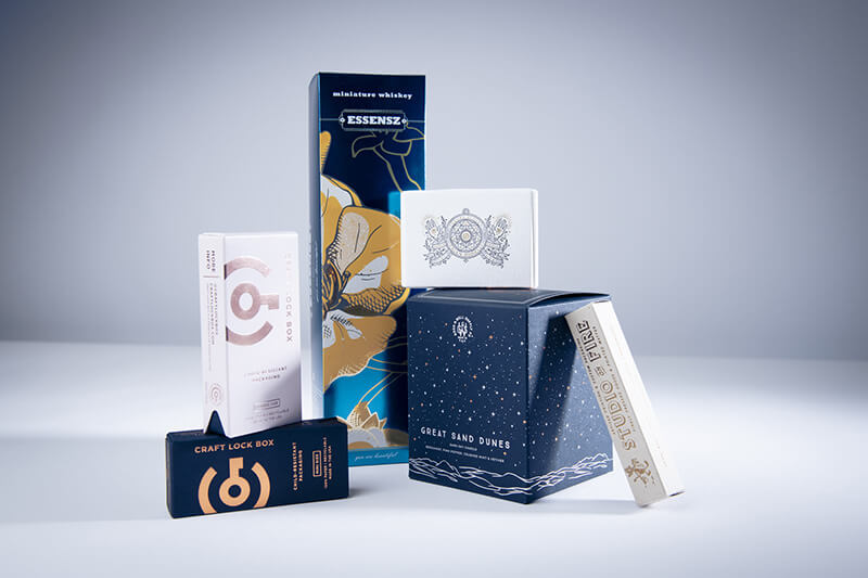 Various folding cartons with hot foil embellishment